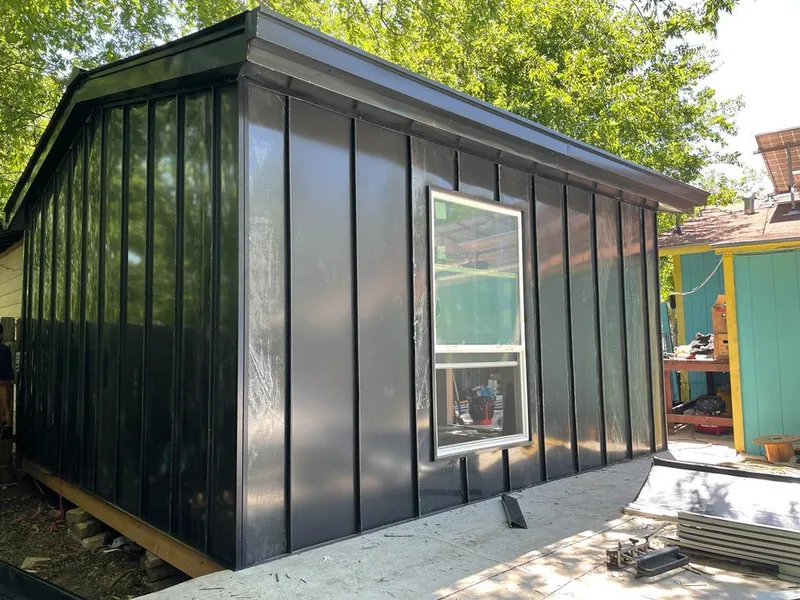 Black standing seam metal wall panels for Metal Roof Installation in St. Johns